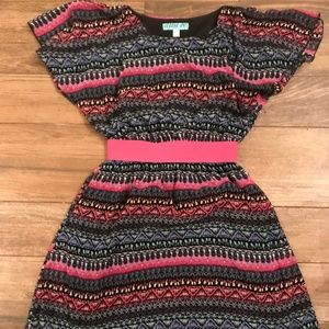 Black mini dress with aztec inspired pattern